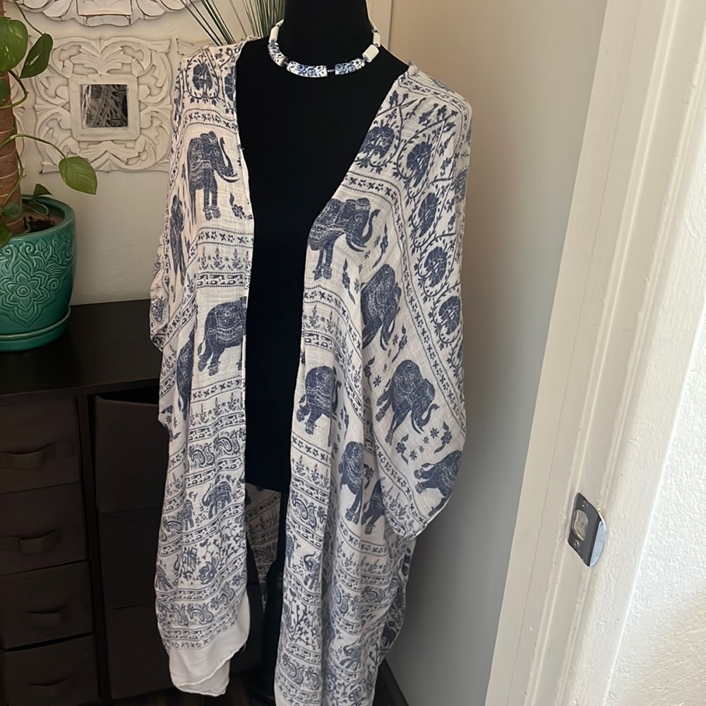 FREE. elephant print cover. blue and white.
